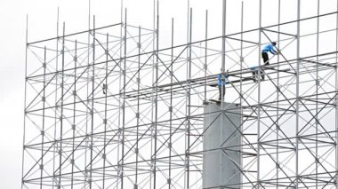 İnsanların çalışma bina yeni büyük Billboard