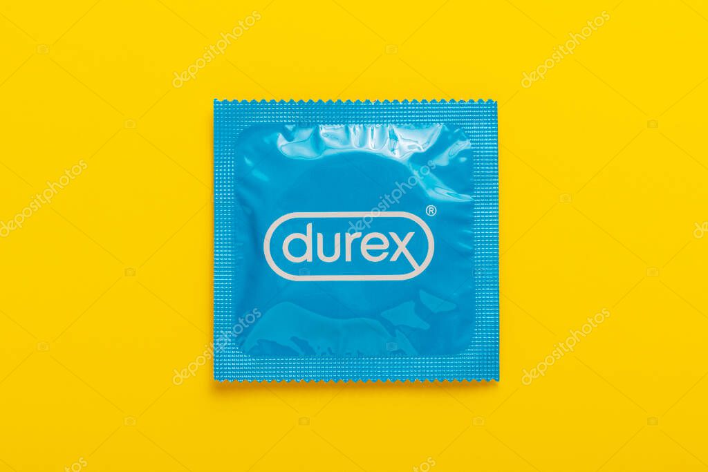 Lviv, Ukraine - August 24, 2021. Durex Condom isolated on yellow background.