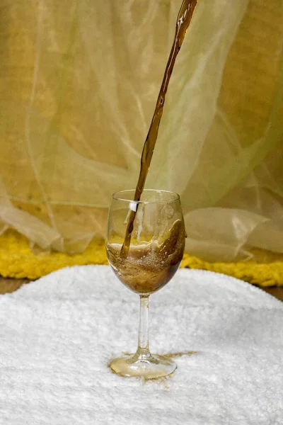 fizzy drink poured into a glass