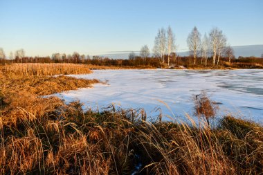 Gün batımında güneşteki ilk buz