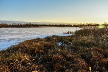 Gün batımında güneşteki ilk buz
