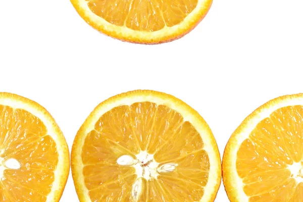 Oranje Plakjes Een Witte Achtergrond — Stockfoto