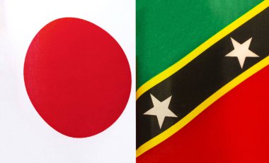 Japonya 'nın ulusal bayrakları ve Saint Kitts ve Nevis Federasyonu' nun parçaları.