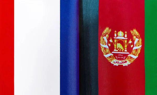 Fragmente Der Nationalflaggen Frankreichs Und Afghanistans Nahaufnahme — Stockfoto