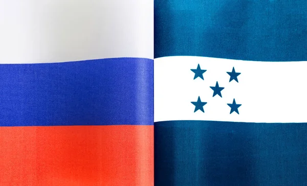 Фрагменты Национальных Флагов России Гондурасской Республики Крупным Планом — стоковое фото