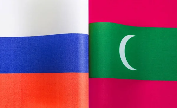 Fragmente Der Nationalflaggen Russlands Und Der Malediven Großaufnahme — Stockfoto
