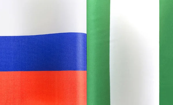Фрагменты Национальных Флагов России Республики Нигерия Крупным Планом — стоковое фото