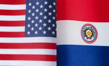 Birleşik Devletlerin ve Paraguay Cumhuriyeti 'nin bayraklarının parçaları yakın planda.