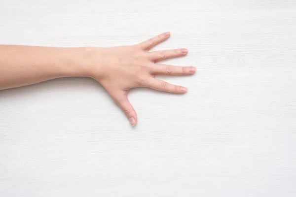 Женская Рука Белом Фоне Деревянной Стены — стоковое фото