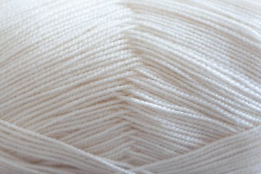 Beyaz yün iplikler doku arkaplanı.