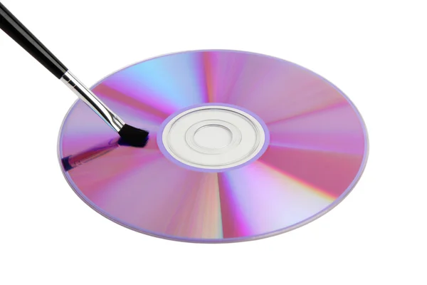 CD Dvd gegevens schijf en schoonmaakborstel — Stockfoto