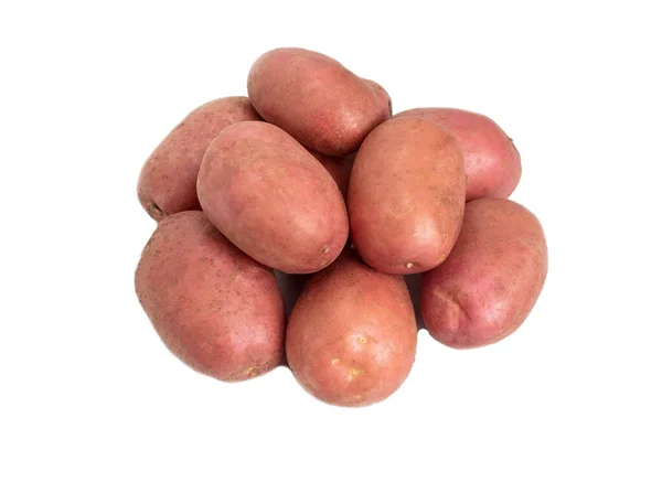 Червона натуральна картопля на білому тлі, ізольована. Крупним планом — стокове фото