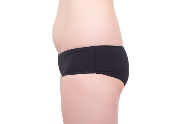 Womans buttocks, belly and hips on a white background. Woman flat figure, buttock augmentation, plastic surgery, isolate