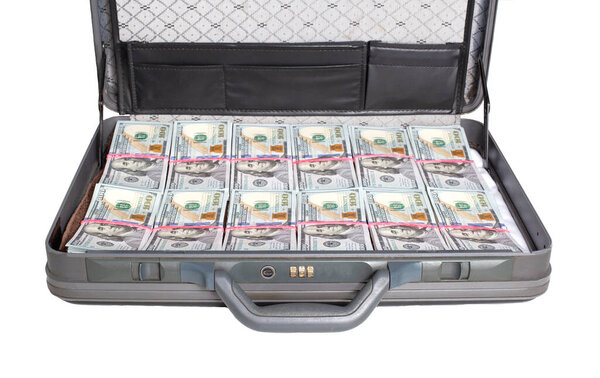 Open suitcase with money dollars on a white background. Healthcare and pharmaceutical spending concept, financing