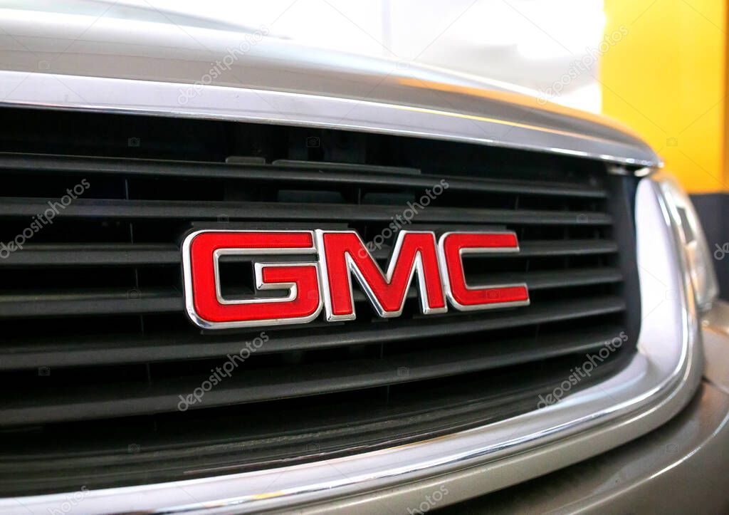 MINSK, BELARUS 07.10.19: GMC car emblem on the car hood. Concept of brand and quality cars, close-up. Industry
