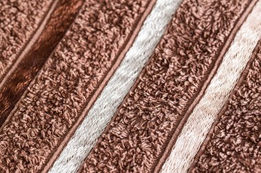 Kahverengi havlu, arka plan, yakın plan el yapımı.