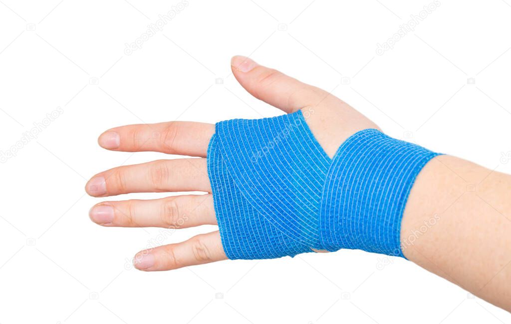 Blue elastic bandage on the wrist on a white background, isolate. Concept for fixation of the wrist joint for sports and avoidance of injuries, close-up, flexible