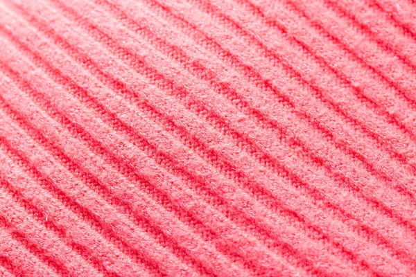 Rózsaszín pulóver egy sorban, háttér, makro, hagyományos — Stock Fotó