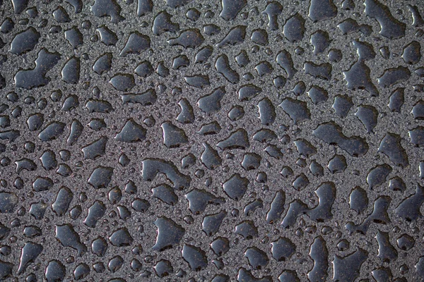 新しいアスファルトの雨滴 — ストック写真