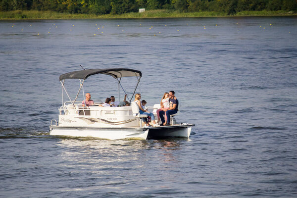 Pleasure boat with passengers on the Dnieper river in Kiev