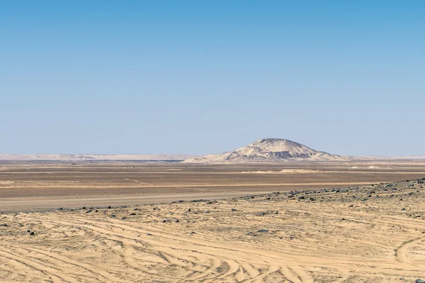 Black desert lanscape and basalt formarions — Stock Photo, Image