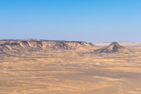 Black desert lanscape and basalt formarions — Stock Photo, Image