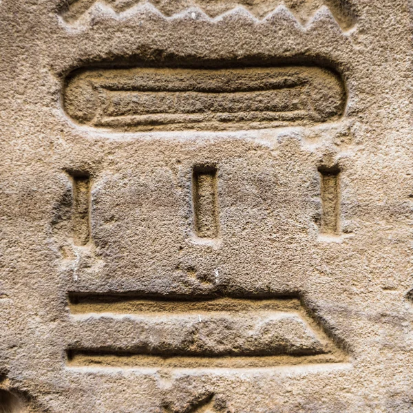 Egyptian hieroglyphs on the wall in a temple — Stock Photo, Image