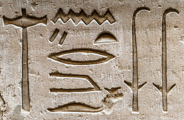 Egyptian hieroglyphs on the wall in the Sobek temple in Kom Ombo, Egypt