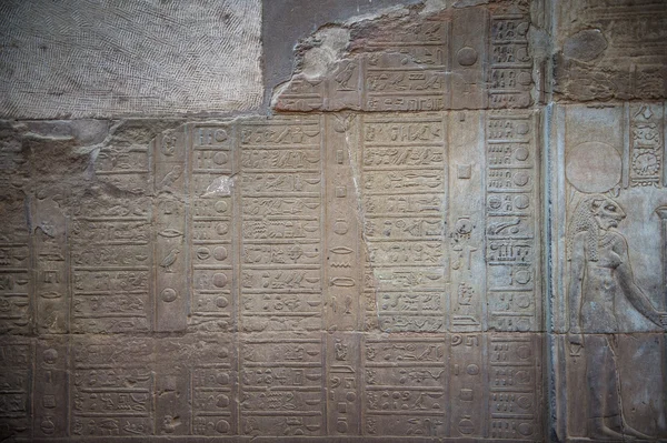 Egyptian hieroglyphs on the wall in the Sobek temple in Kom Ombo, Egypt