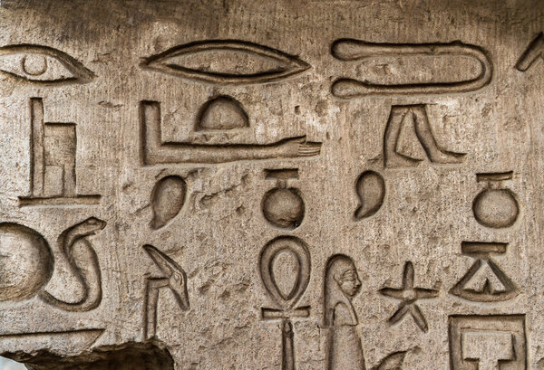 Egyptian hieroglyphs on the wall in the Sobek temple in Kom Ombo, Egypt