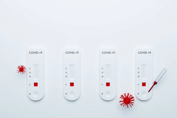 COVID-19 Rapid test kit, fast blood test COVID19 disease with different result of test, 3D illustrations rendering