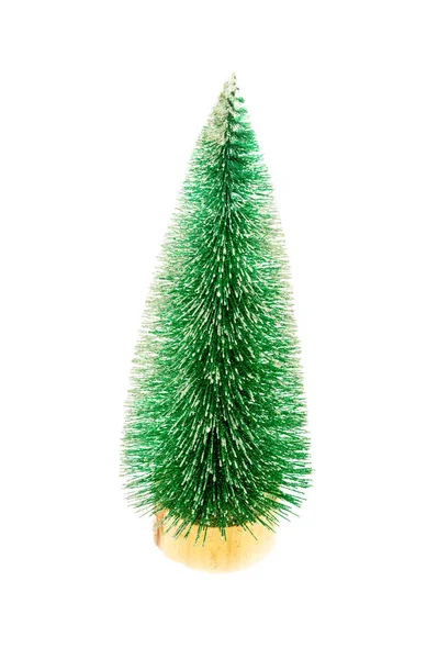 Konstgjord grön julgran med träställning Isolerad på — Stockfoto