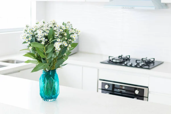 Cute flower arrangement in a home kitchen