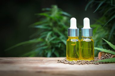 CBD yağ kenevir ürünleri, kenevir özü ahşap bir masa üzerinde yağ, tıbbi marihuana.