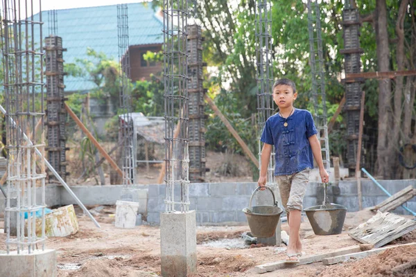 Poor children are forced to work construction, Violence children and trafficking concept,Anti-child labor, Rights Day on December 10.