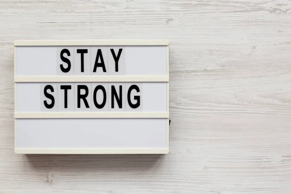 Stay Strong Lightbox White Wooden Surface Top View Flat Lay — Stock Photo, Image