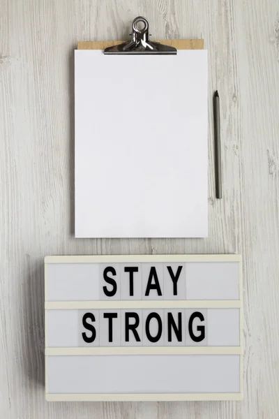 Stay Strong Lightbox Clipboard Blank Sheet Paper White Wooden Surface — Stock Photo, Image