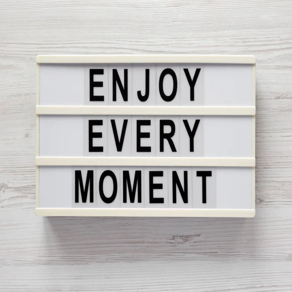 Enjoy Every Moment Lightbox White Wooden Surface Top View Flat — Stock Photo, Image