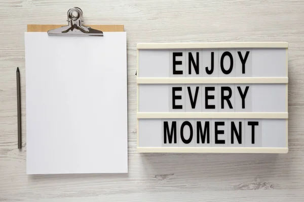 Enjoy Every Moment Lightbox Clipboard Blank Sheet Paper White Wooden — Stock Photo, Image