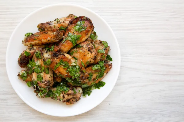 Homemade Baked Garlic Parmesan Chicken Wings White Plate White Wooden — Stock Photo, Image