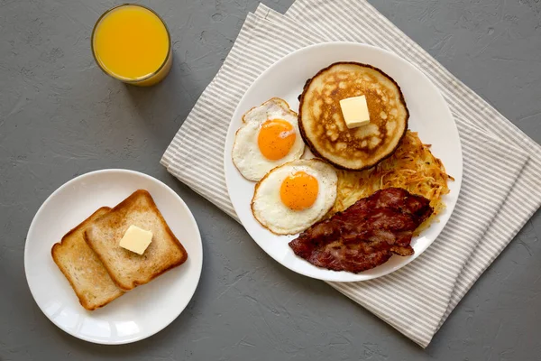 Full American Breakfast Bacon Hash Browns Eggs Pancakes Plate Gray — Stock Photo, Image