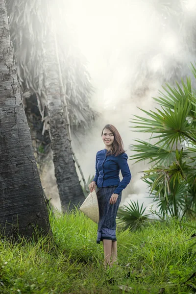 Thai Farmer woman wearing typical Thai dress, on Rice fields bac — Stock Photo, Image