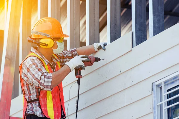 Worker man with safety helmet Construction building industry