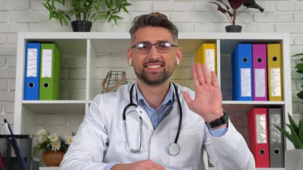 ( 영어 ) Webcam view doctor greets patients online video call laptop — 비디오