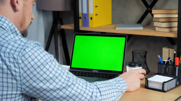 Green screen laptop concept: Businessman listen employee online video call chat