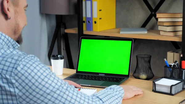 Green screen laptop concept: Businessman listen employee online video call chat