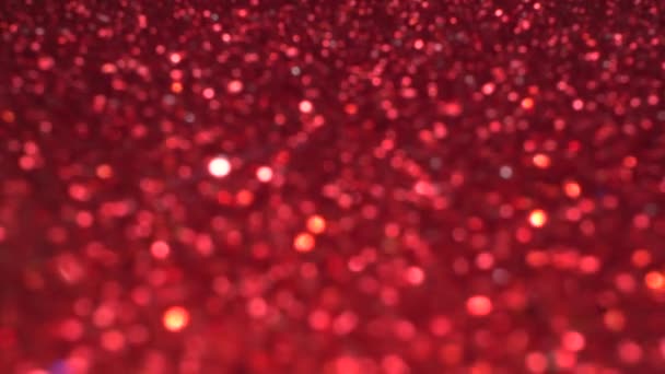 Brilliant background for Christmas and new year holiday. Red moving sniny sequins — Vídeo de stock