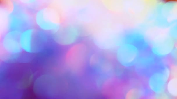 Crystal prism refracting light in vivid neon colors glow. Glass pastel purple pink teal holographic background. Festive background, beautiful romantic glamorous — Stockvideo