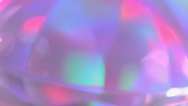 Rainbow sparkling glow, lens flare. Pastel purple pink blue glowing. Refraction of rays through a prism. Abstract festive moving holiday texture — 图库视频影像
