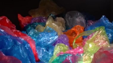 Plastic Crisis. A bunch of used discarded disposable plastic bags and food packaging. The concept of environmental pollution. Plastic free life